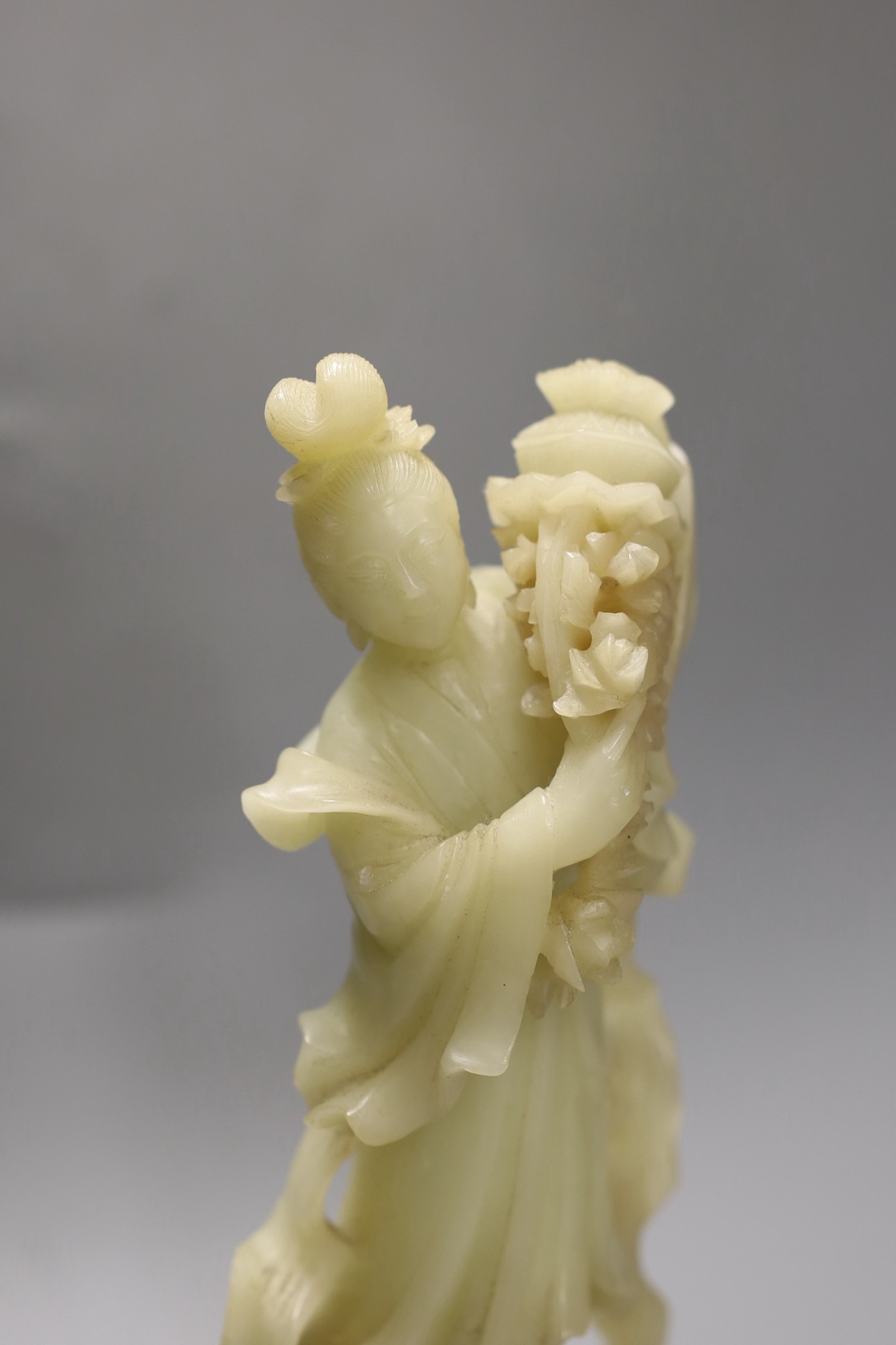 A soapstone figure, a nephrite censer and two hardstone carvings tallest 25cm